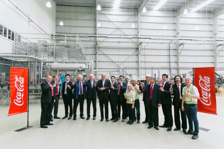 Ambassador Daniel A. Clune celebrating the official opening of Coca-Colaâ€™s new bottling plant in Vientiane.